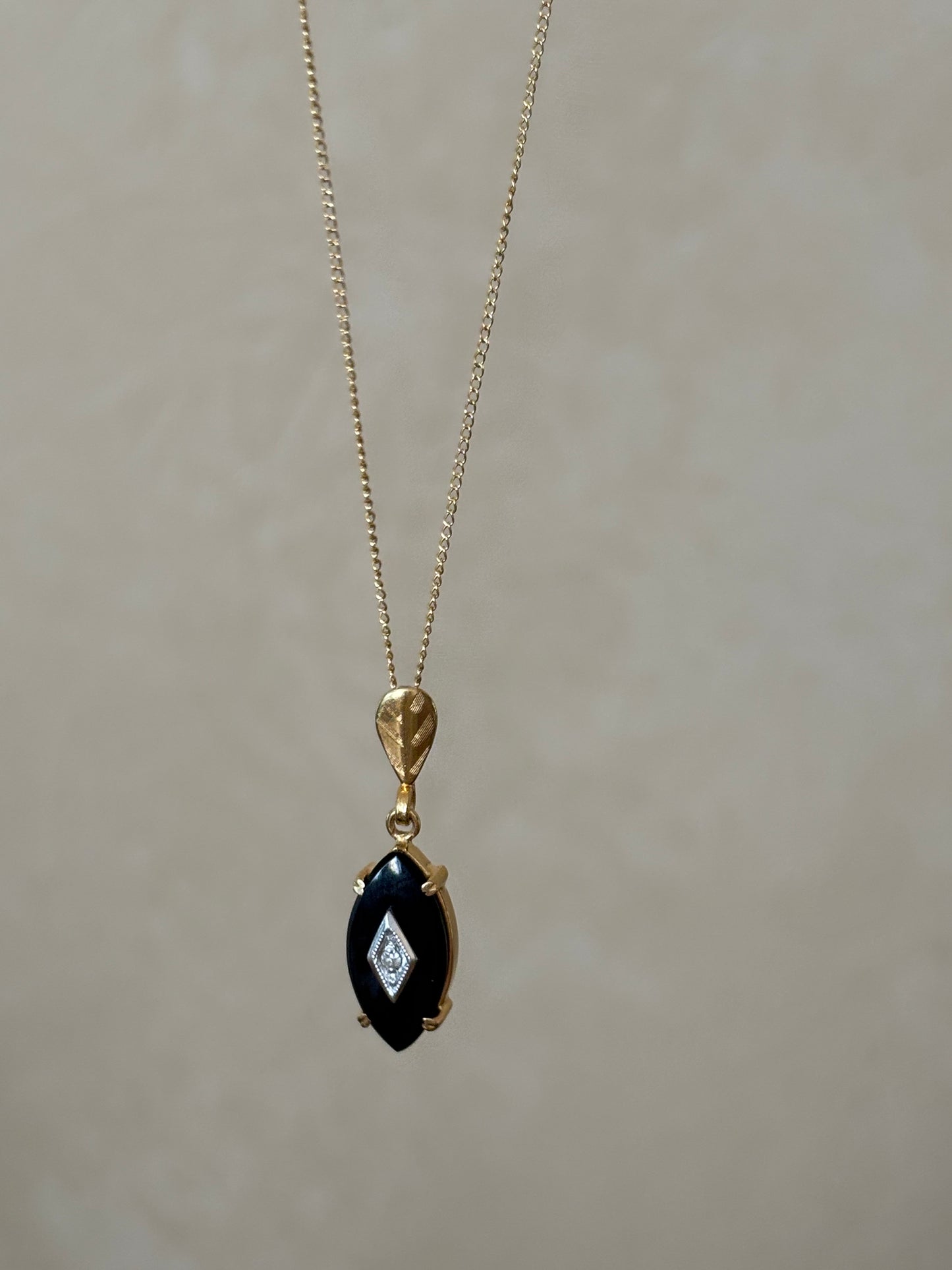 Devon’s Pick: Antique, 14K Gold Onyx and Diamond Pendant